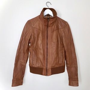 Black Rivet brand Genuine leather  brown jacket.